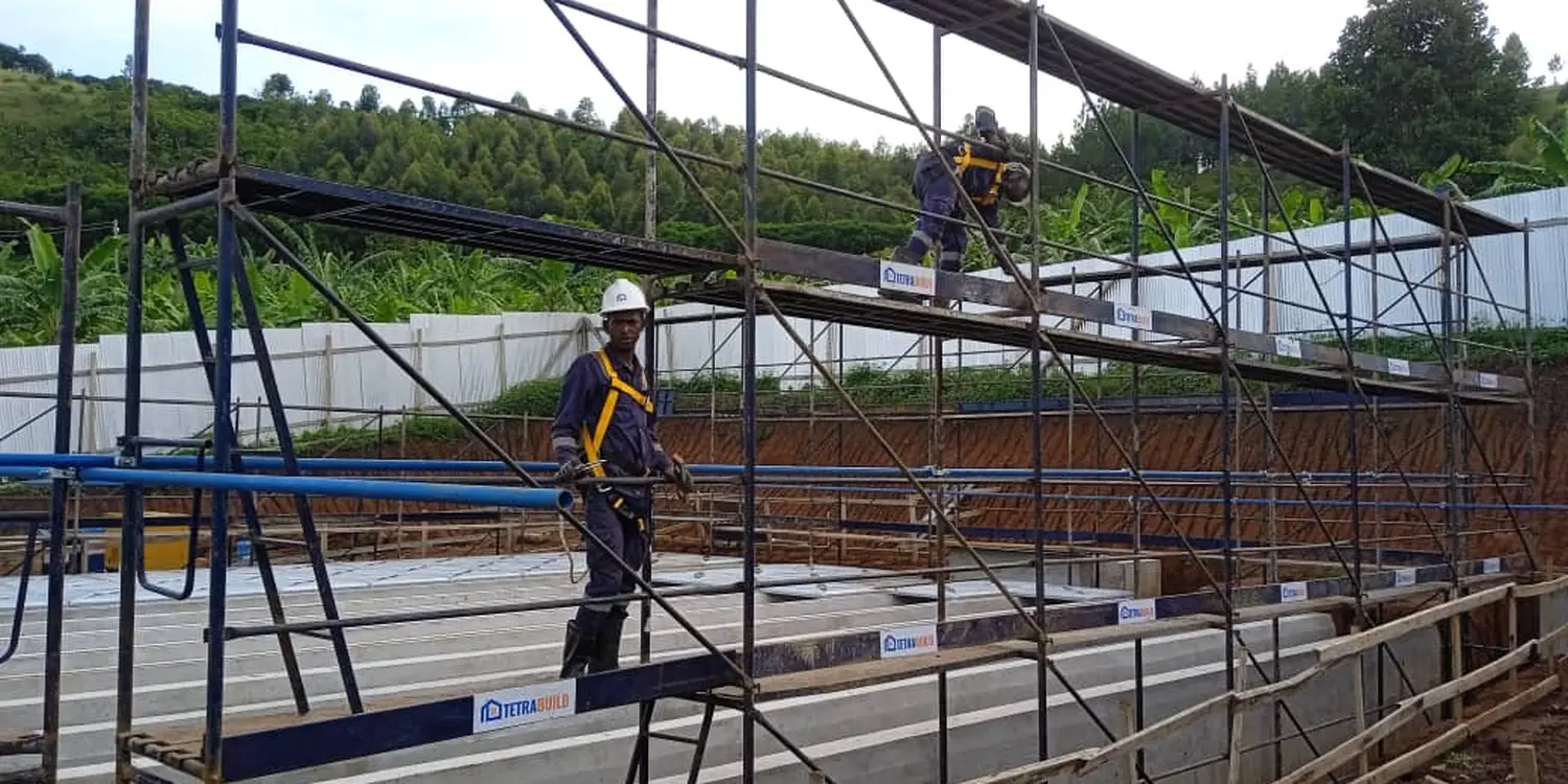 Tetrabuild scaffolding and access decks erected over a walkway on a government infrastructure project