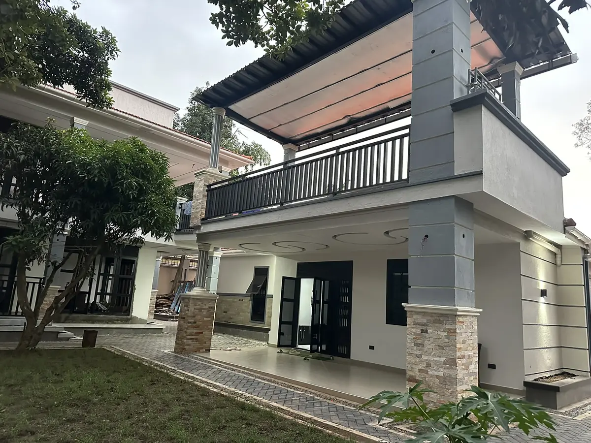 Completed two-storey residence with rendered finishes and aluminium glazing