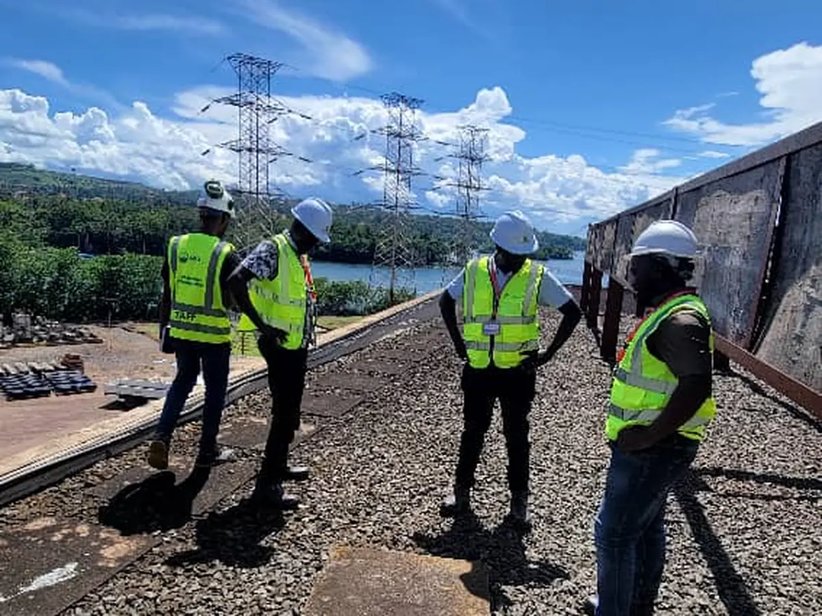Tetrabuild engineers reviewing membrane works on a deck at Kiira Power Station