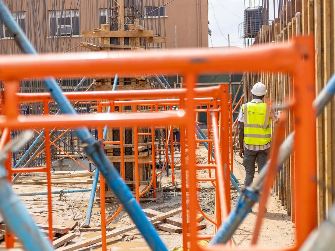 Scaffolding and formwork around a multi-storey building under construction